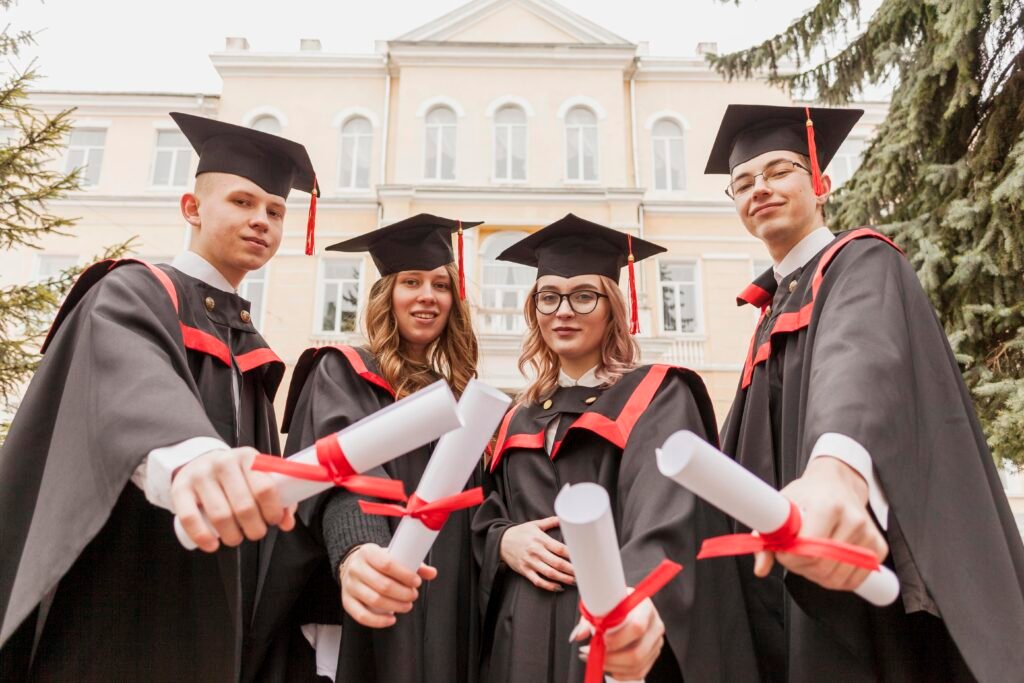 group colleagues with diploma